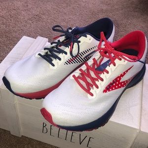 Brooks running shoes size 10, worn once.